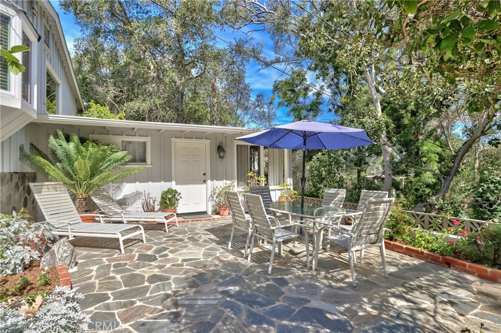 1175 Riverview Drive Fallbrook, CA 92028 - Photo 30 of 57 a patio with a yard table and chairs