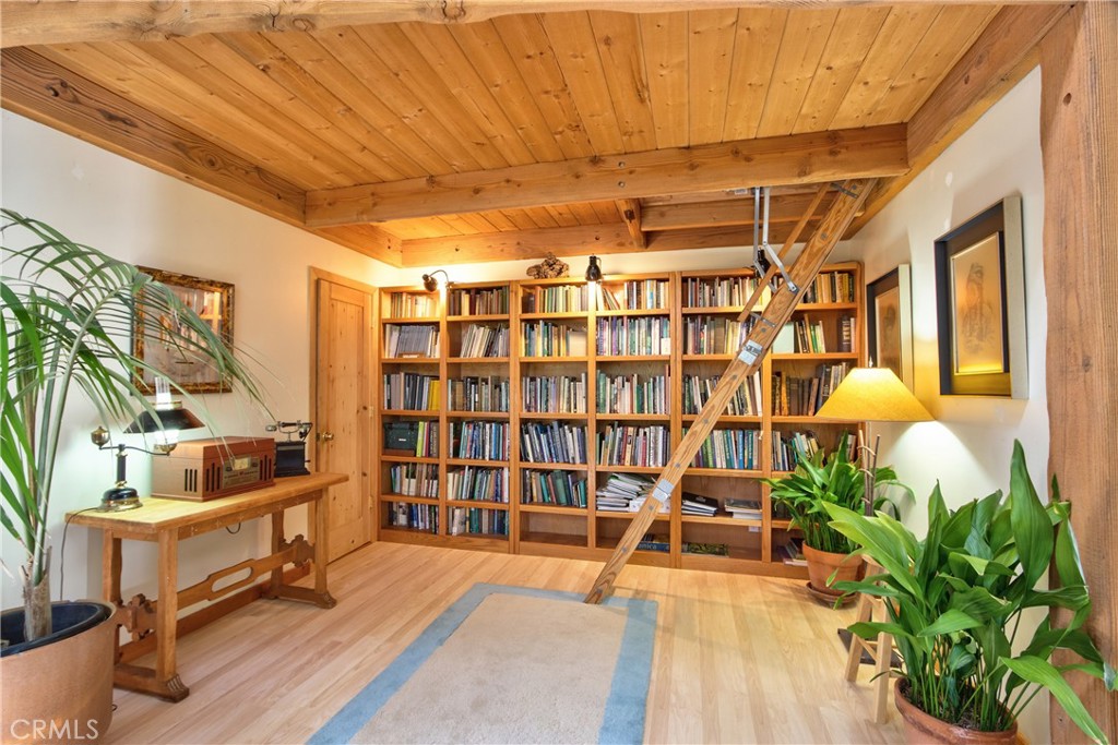 1175 Riverview Drive Fallbrook, CA 92028 - Photo 40 of 57 a view of front door with wooden floor and a potted plant