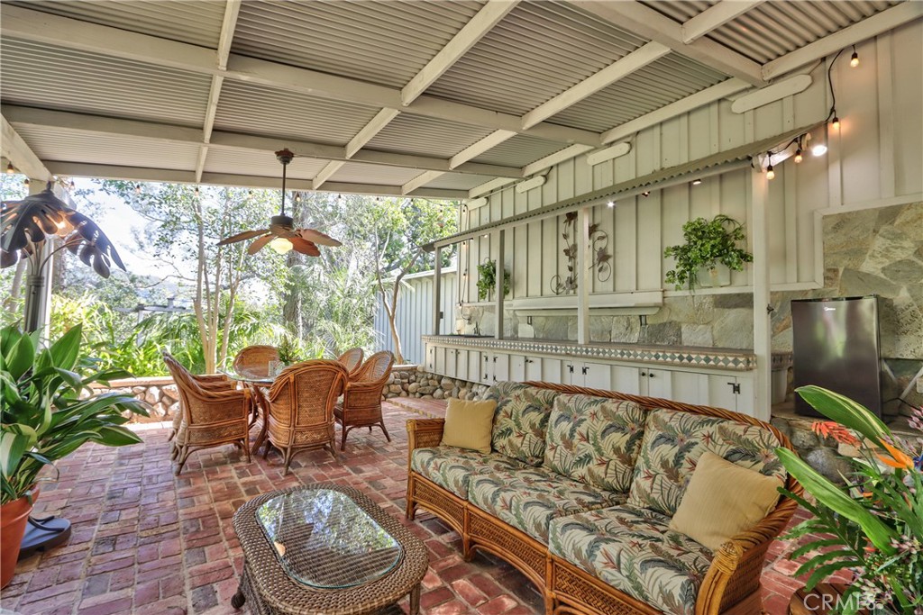 1175 Riverview Drive Fallbrook, CA 92028 - Photo 44 of 57 a roof deck with table and chairs and potted plants