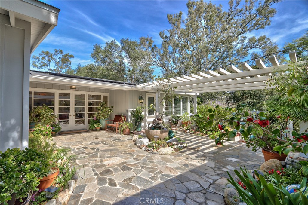 1175 Riverview Drive Fallbrook, CA 92028 - Photo 6 of 57 a group of people sitting in front of a house