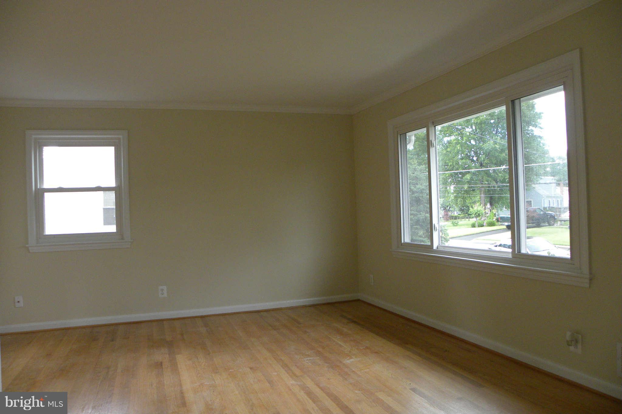 4140 Addison Road Fairfax, VA 22030 - Photo 3 of 27 a view of an empty room with a window