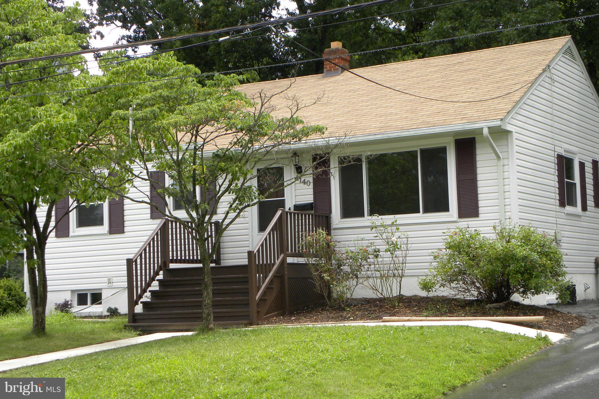 4140 Addison Road Fairfax, VA 22030 - Photo 21 of 27 a view of a house with a yard