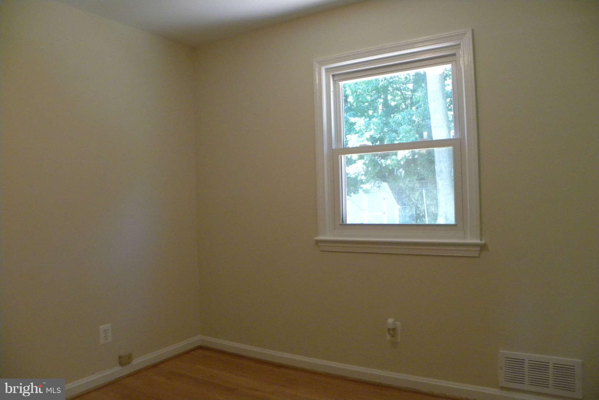 4140 Addison Road Fairfax, VA 22030 - Photo 9 of 27 an empty room with a window