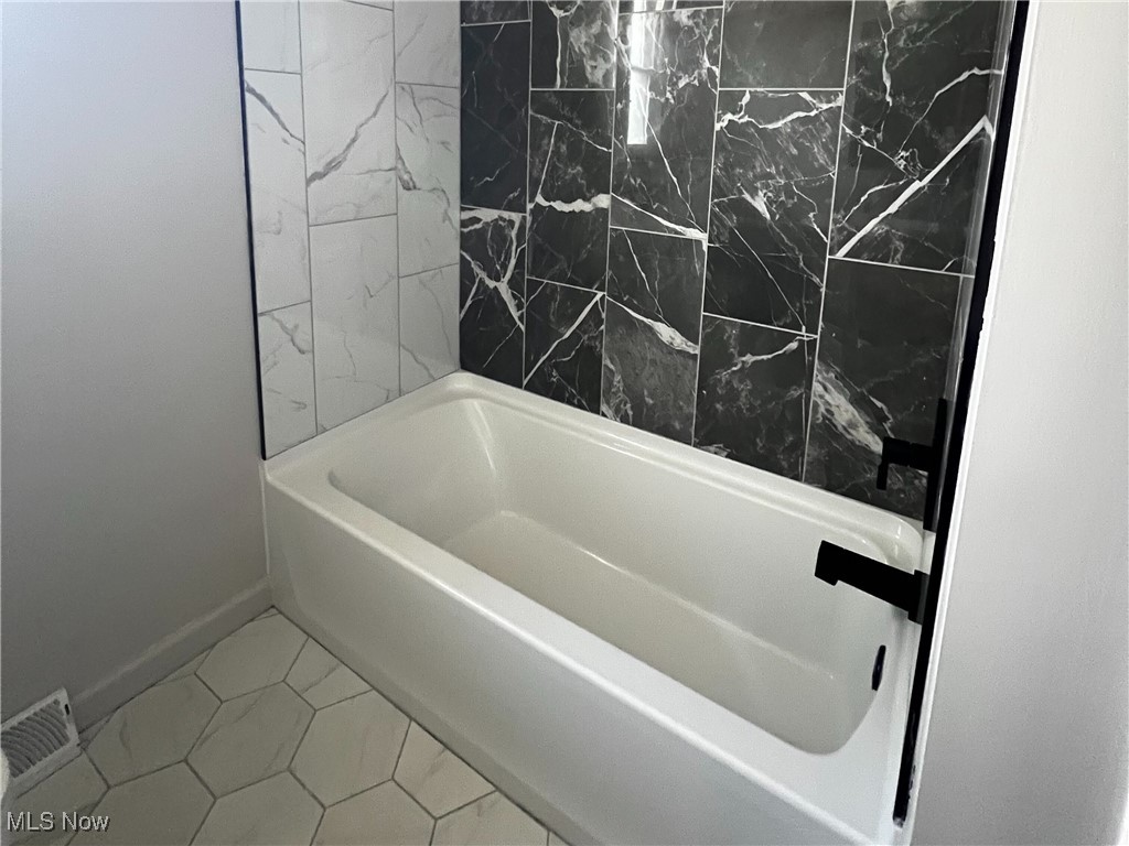10356 Broadview Road Broadview Heights, OH 44147 - Photo 10 of 24 Bathroom with light tile patterned floors and baseboards