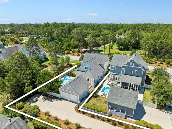 an aerial view of house with yard