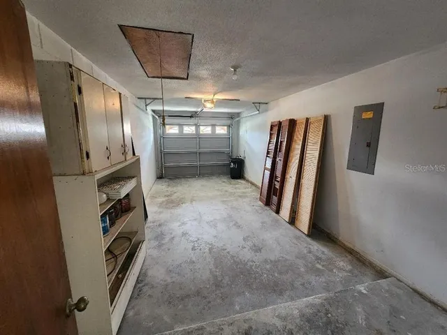 a view of a refrigerator in kitchen