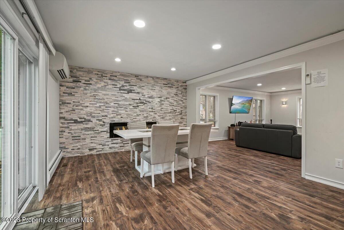 110 Chipmunk Drive Tafton, PA 18464 - Photo 14 of 60 a view of a dining room with furniture and wooden floor