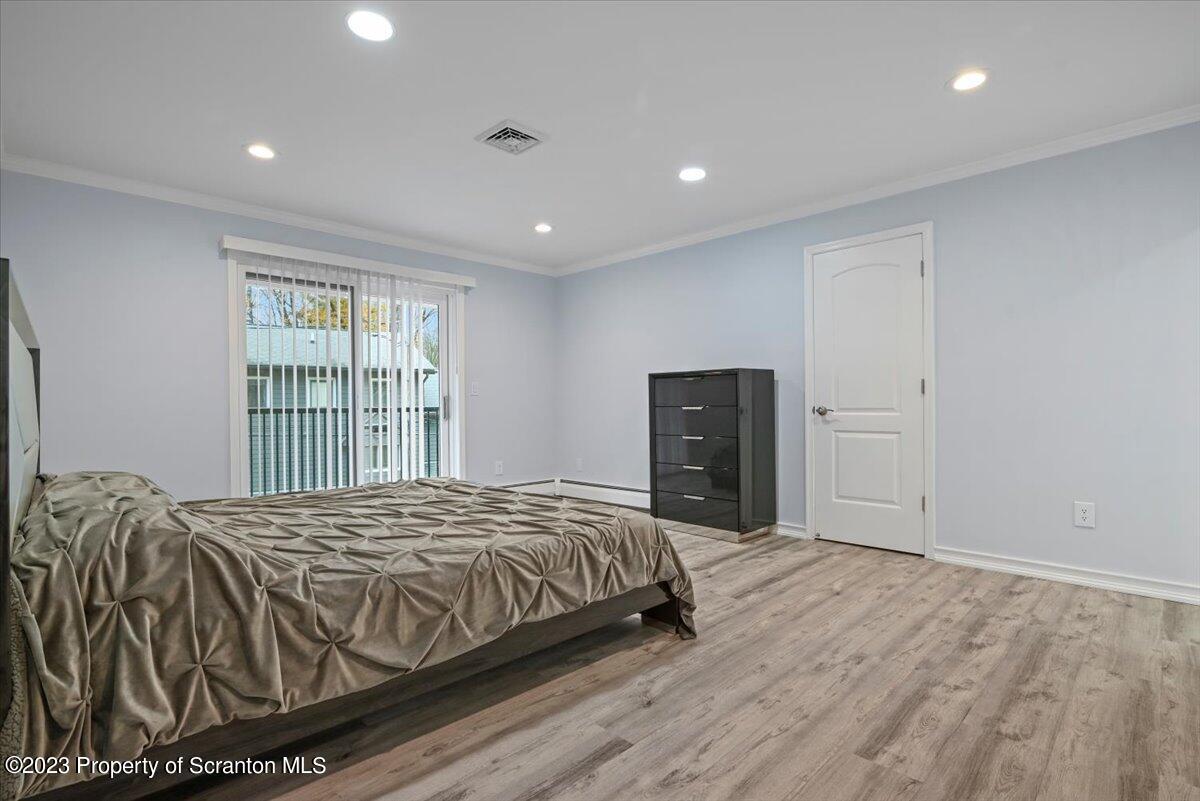 110 Chipmunk Drive Tafton, PA 18464 - Photo 24 of 60 a bedroom with a bed and a window