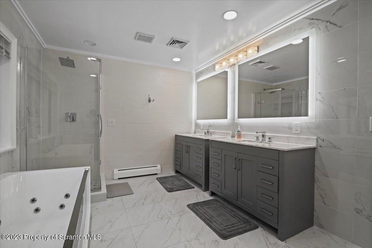 110 Chipmunk Drive Tafton, PA 18464 - Photo 26 of 60 a bathroom with a double vanity sink mirror and shower