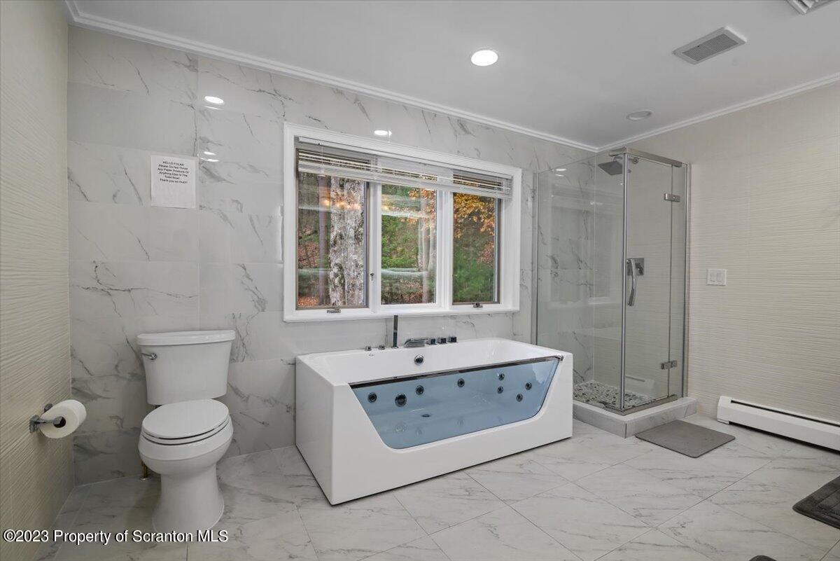 110 Chipmunk Drive Tafton, PA 18464 - Photo 27 of 60 a bathroom with a sink toilet and shower