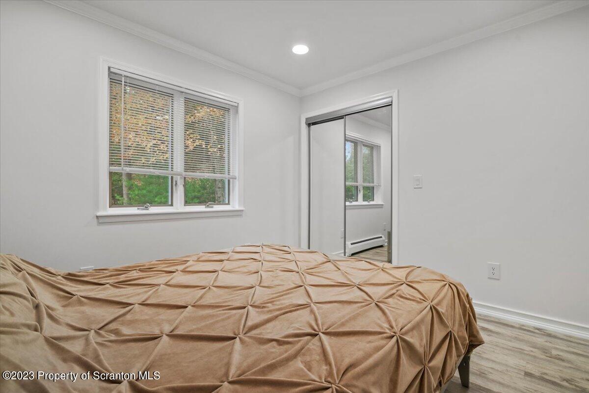 110 Chipmunk Drive Tafton, PA 18464 - Photo 29 of 60 a bedroom with a bed and a window