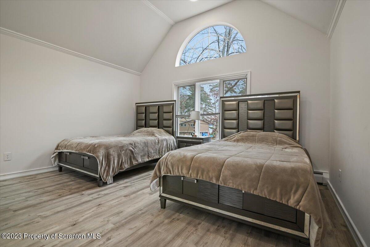 110 Chipmunk Drive Tafton, PA 18464 - Photo 32 of 60 a bedroom with two beds and a table