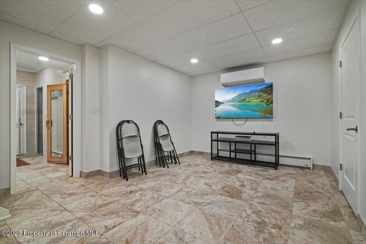 110 Chipmunk Drive Tafton, PA 18464 - Photo 38 of 60 a view of a livingroom with furniture and workspace