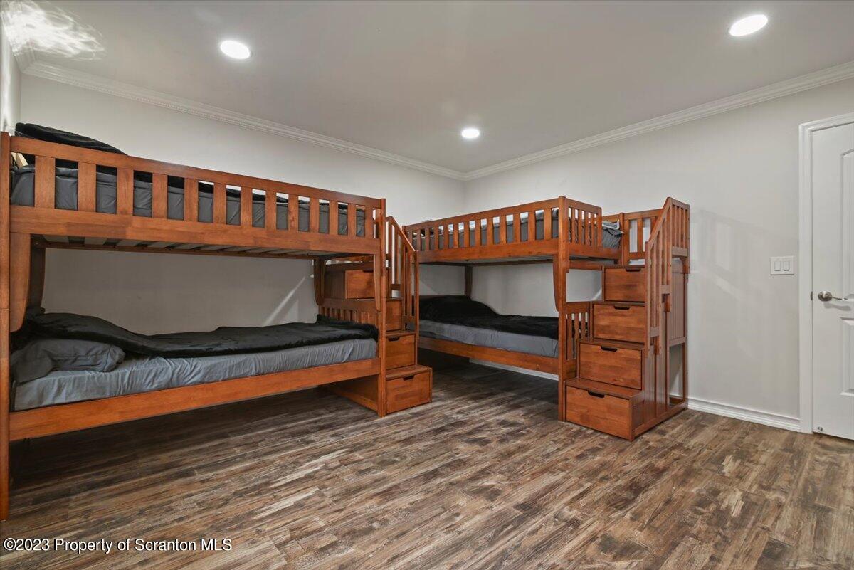 110 Chipmunk Drive Tafton, PA 18464 - Photo 43 of 60 a bedroom with furniture and a dresser