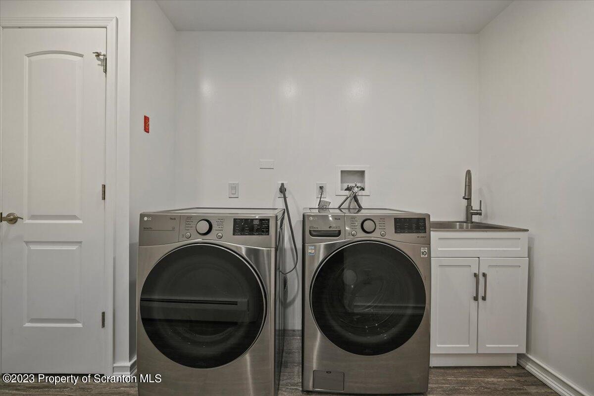 110 Chipmunk Drive Tafton, PA 18464 - Photo 48 of 60 a utility room with dryer and washer