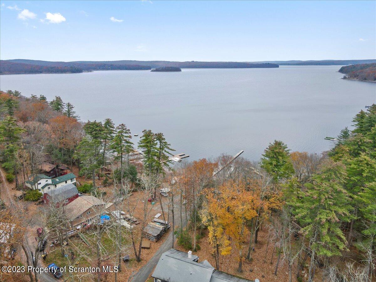 110 Chipmunk Drive Tafton, PA 18464 - Photo 5 of 60 a view of a lake from a balcony
