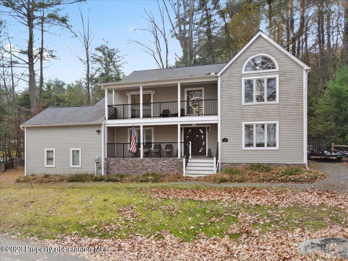 110 Chipmunk Drive Tafton, PA 18464 - Photo 52 of 60 a view of a house with a yard