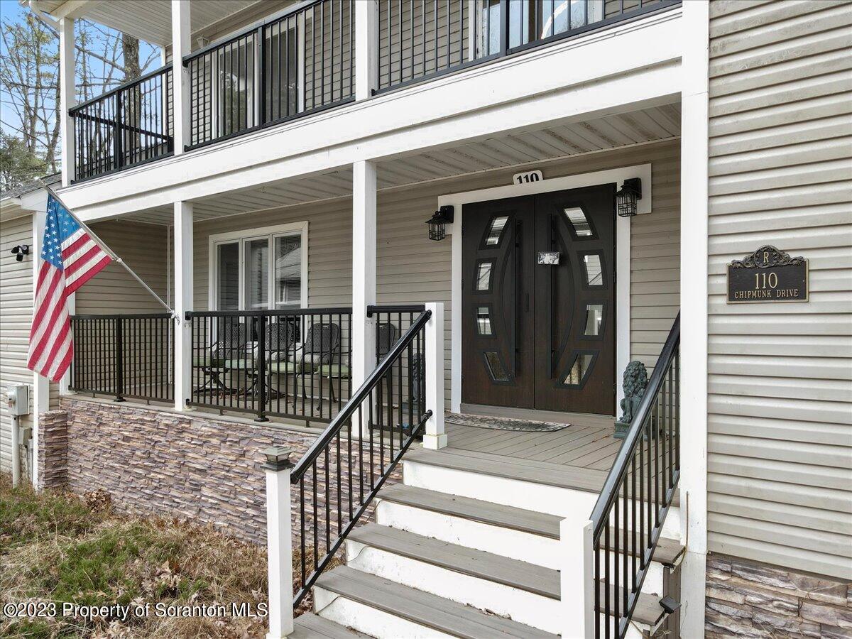 110 Chipmunk Drive Tafton, PA 18464 - Photo 53 of 60 a view of a house with entrance and a porch