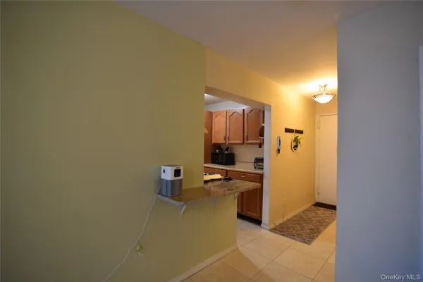 a kitchen with stainless steel appliances a refrigerator and a stove