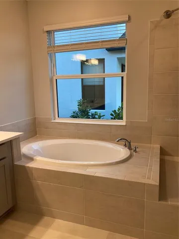 a bathroom with a bathtub