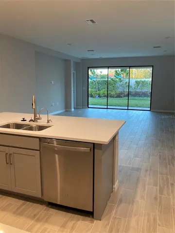 a room with a sink and a vanity