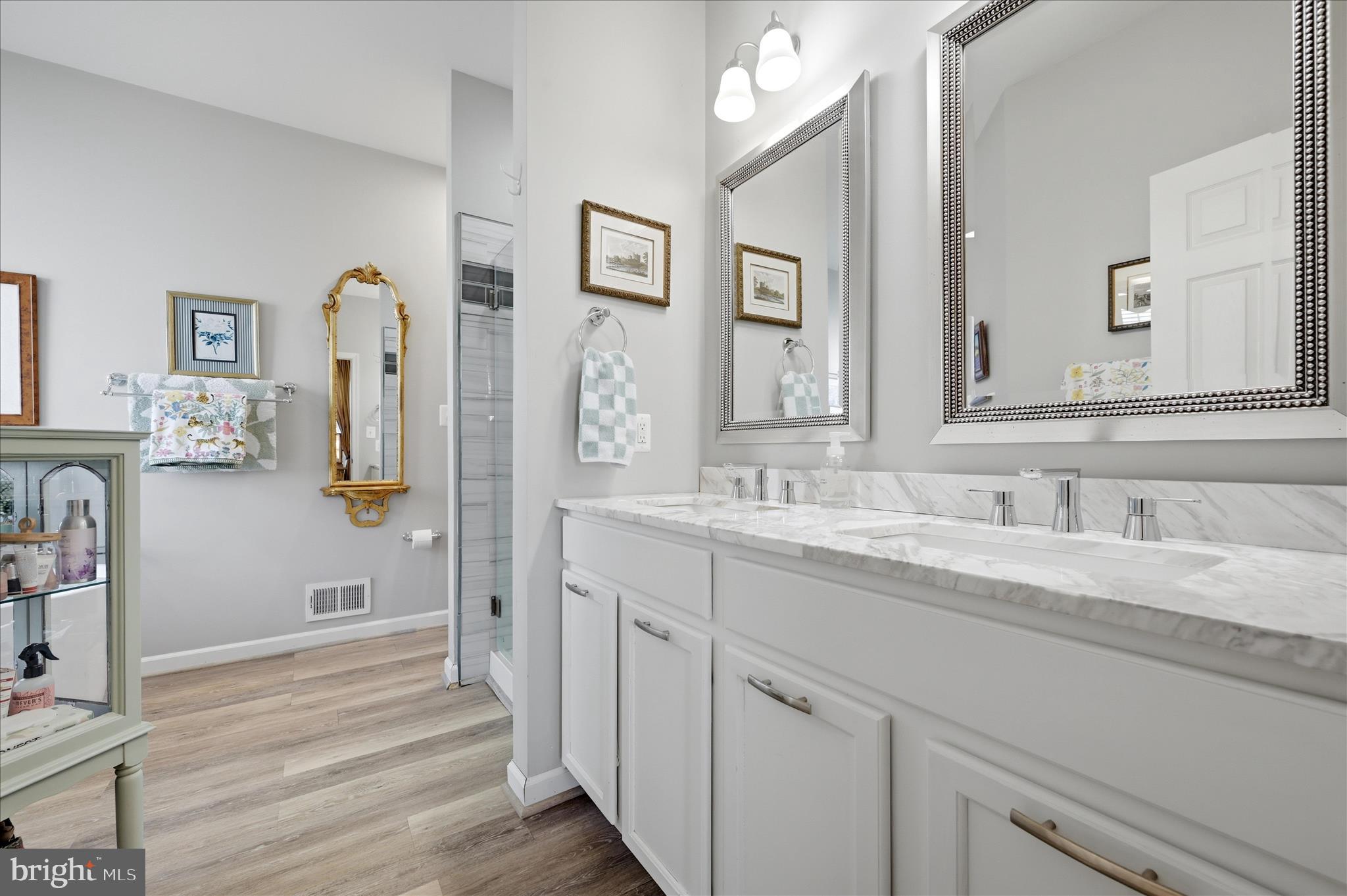 25 Overbrook Road Ranson, WV 25438 - Photo 37 of 83 Primary Bathroom has dual vanities and LVP floors