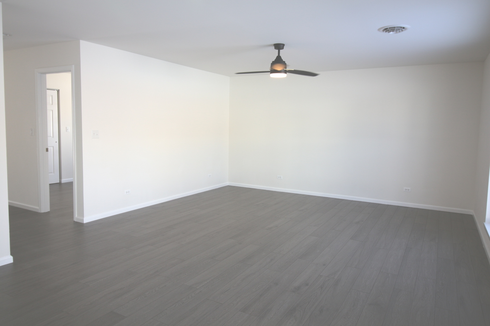 8 Kimberly Road Spring Valley, IL 61362 - Photo 11 of 17 an empty room with a empty space and a ceiling fan