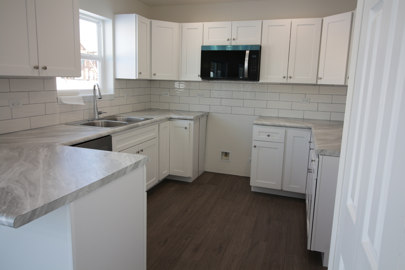 8 Kimberly Road Spring Valley, IL 61362 - Photo 13 of 17 a kitchen with stainless steel appliances white cabinets and a sink