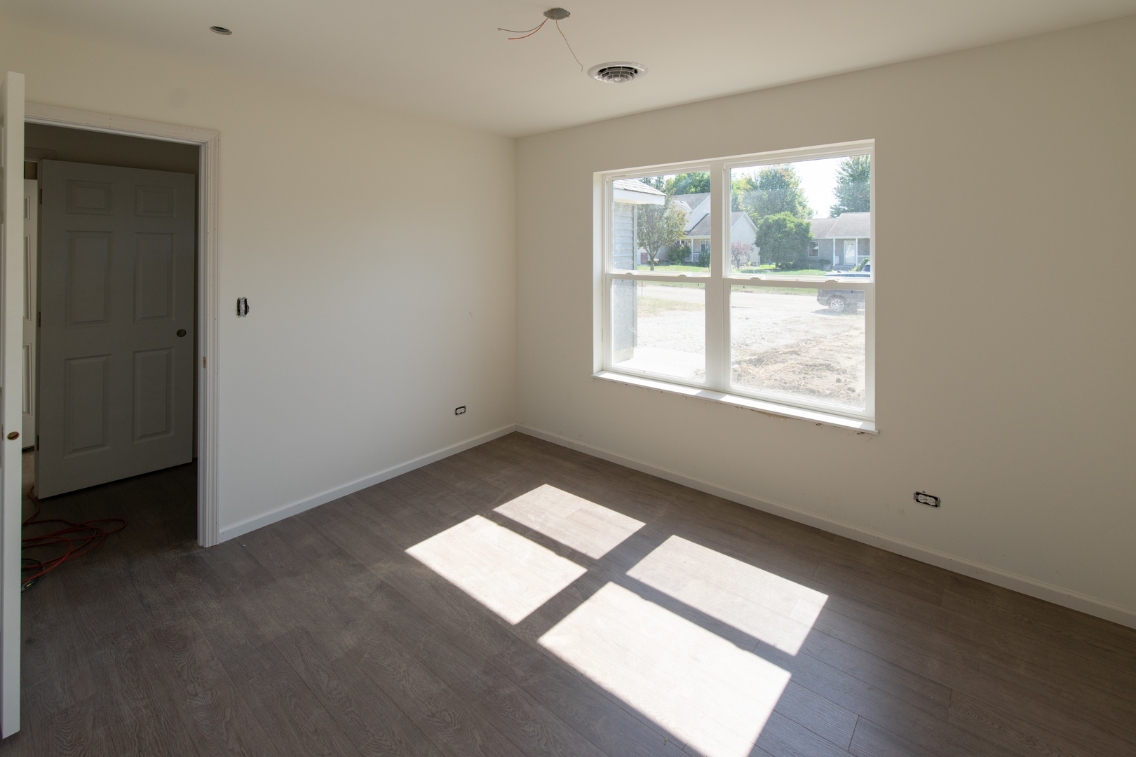 8 Kimberly Road Spring Valley, IL 61362 - Photo 8 of 17 an empty room with wooden floor and windows