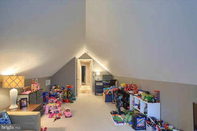 a room with furniture and a garage