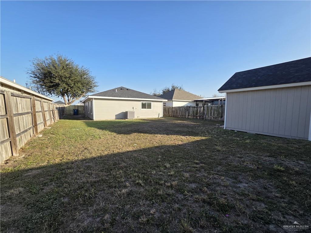 477 Serg Loop Alamo, TX 78516 - Photo 13 of 15 a view of a house with a yard