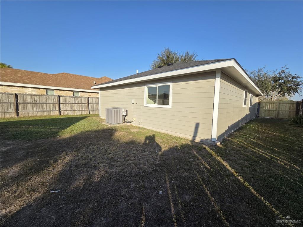 477 Serg Loop Alamo, TX 78516 - Photo 15 of 15 a front view of a house with a yard