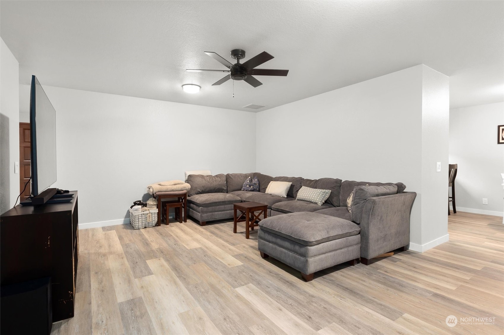 11 170th Place Southeast Bothell, WA 98012 - Photo 11 of 29 a living room with a couch and a flat screen tv
