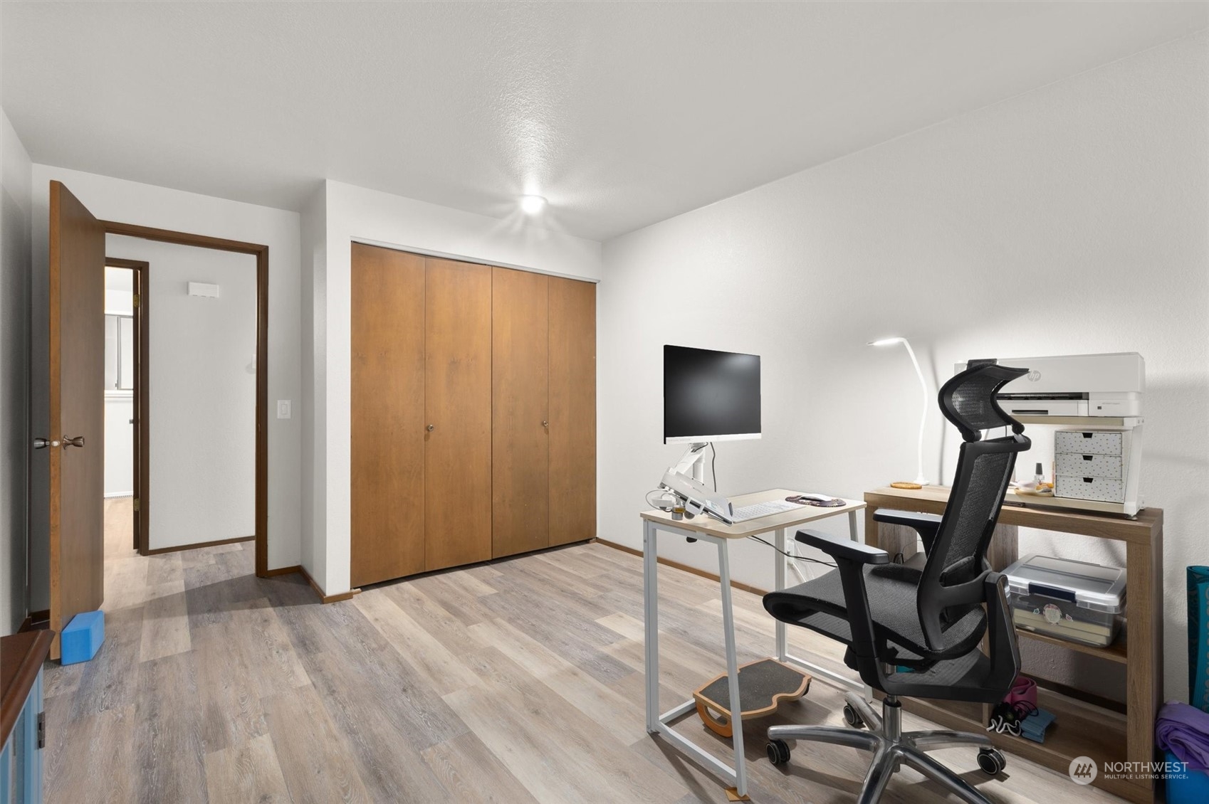 11 170th Place Southeast Bothell, WA 98012 - Photo 16 of 29 a view of a workspace with wooden floor