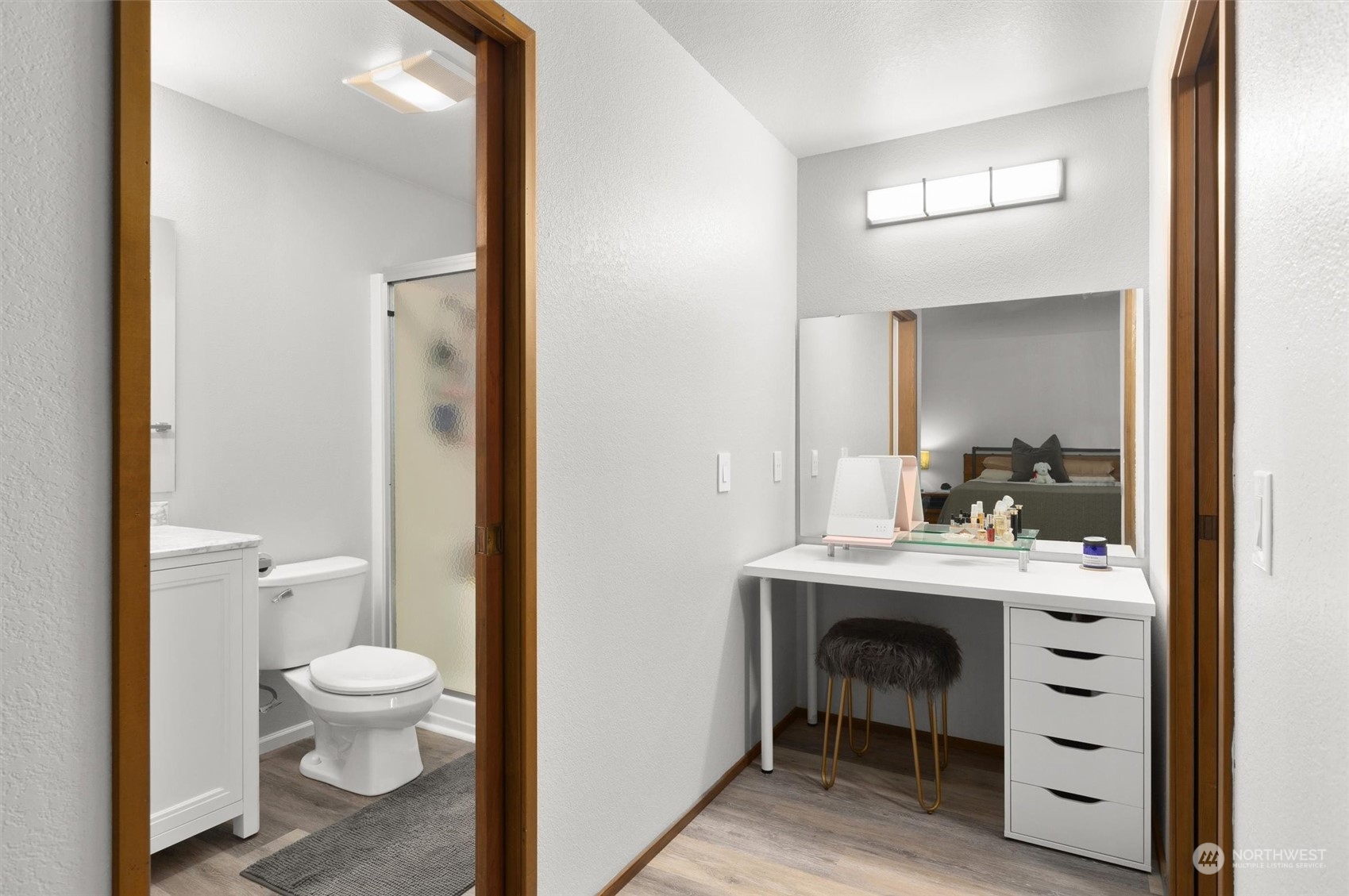 11 170th Place Southeast Bothell, WA 98012 - Photo 20 of 29 a bathroom with a toilet a sink and a mirror