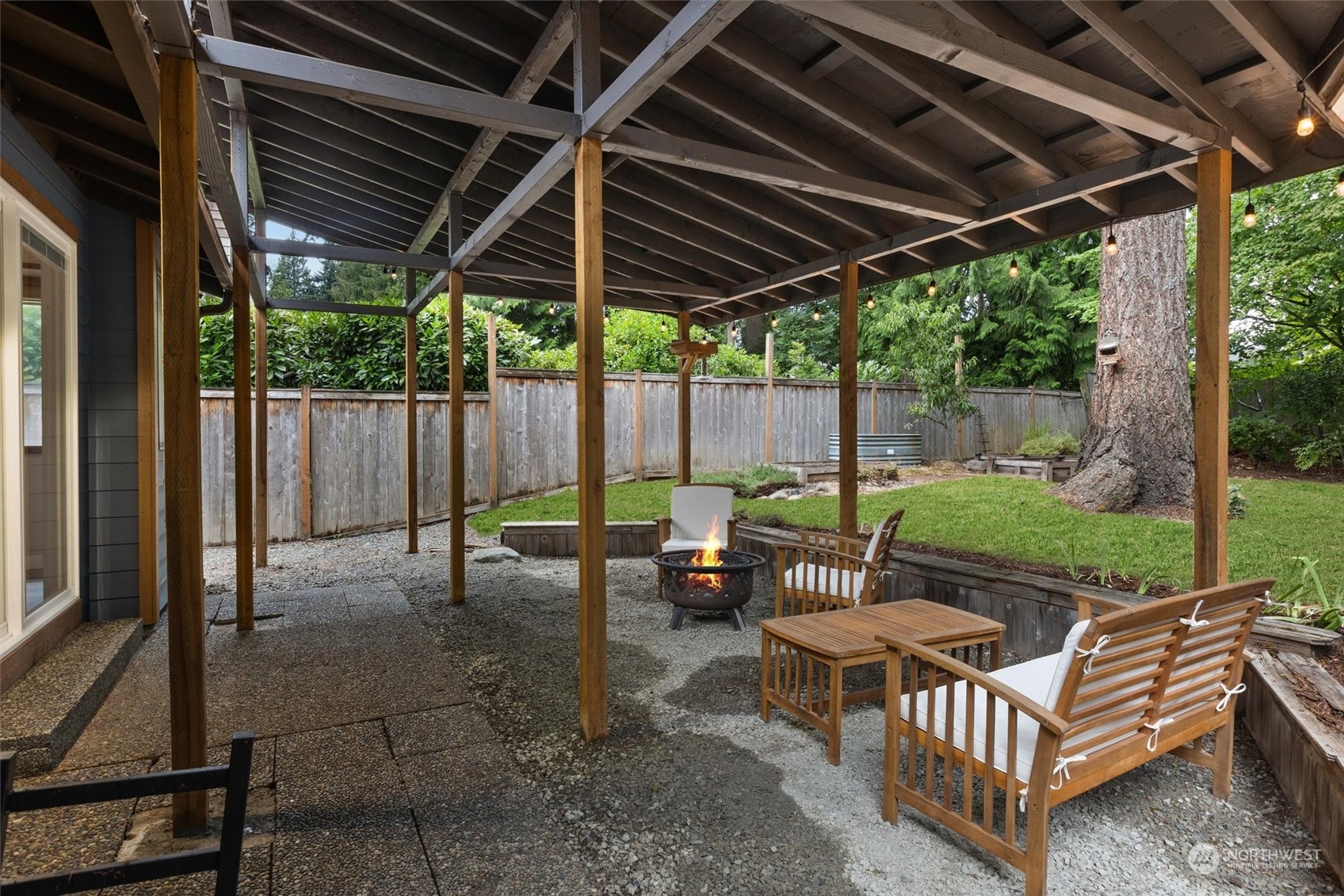 11 170th Place Southeast Bothell, WA 98012 - Photo 25 of 29 a view of a roof deck with couches chairs and a yard