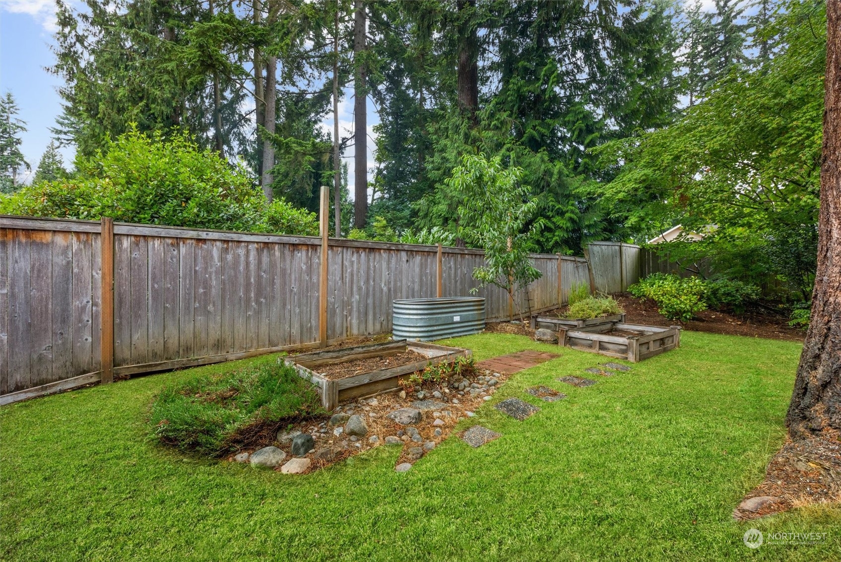 11 170th Place Southeast Bothell, WA 98012 - Photo 28 of 29 a view of a backyard with sitting area
