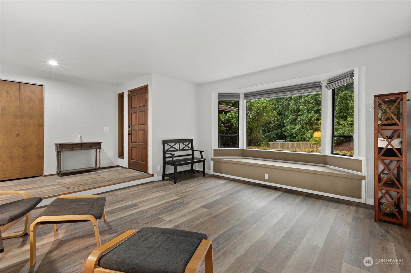 11 170th Place Southeast Bothell, WA 98012 - Photo 3 of 29 a spacious bedroom with a bed and a large window