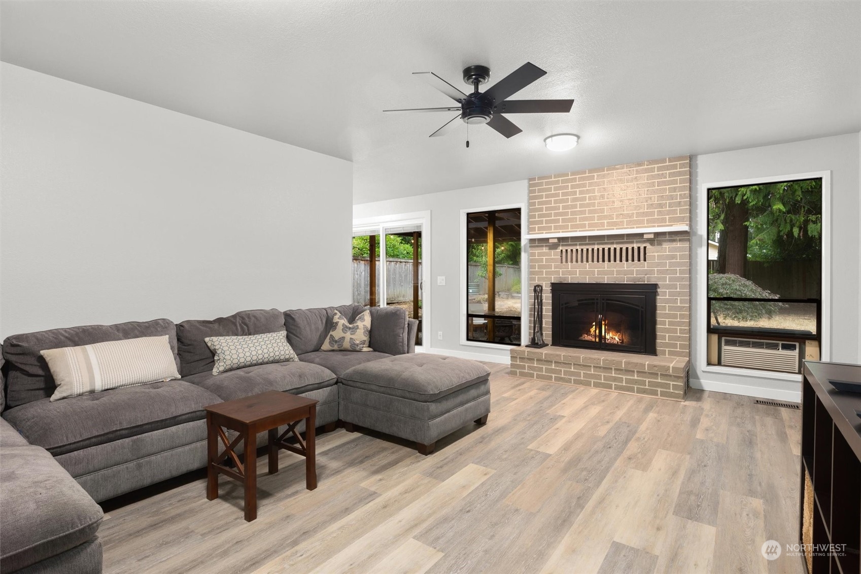 11 170th Place Southeast Bothell, WA 98012 - Photo 10 of 29 a living room with furniture and a fireplace