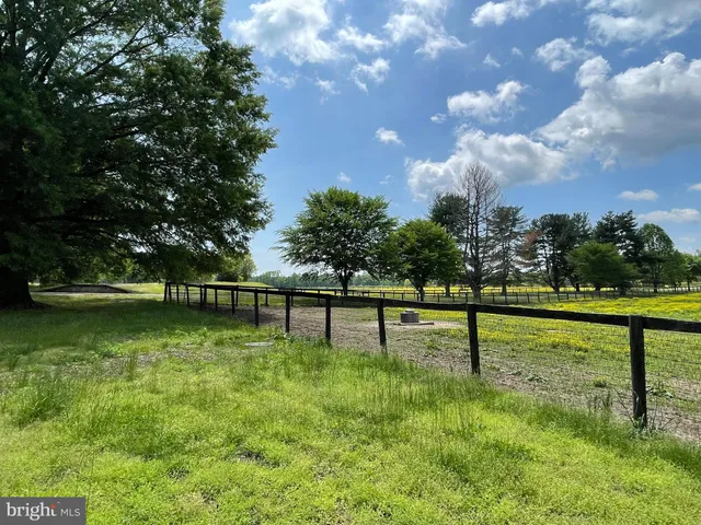 a view of lake with a yard
