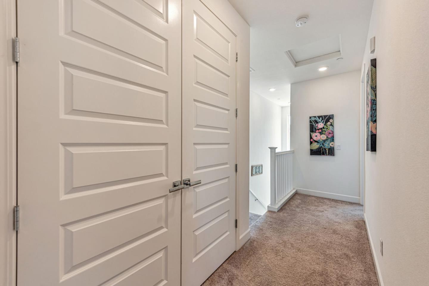 96 Zenith Common Fremont, CA 94539 - Photo 22 of 53 a view of a hallway with closet
