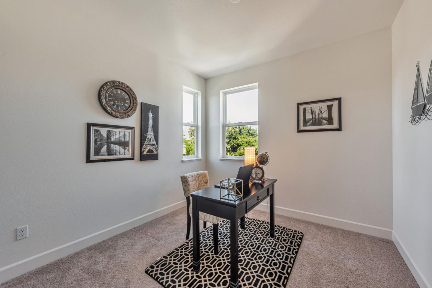 96 Zenith Common Fremont, CA 94539 - Photo 23 of 53 a view of a livingroom with furniture and window