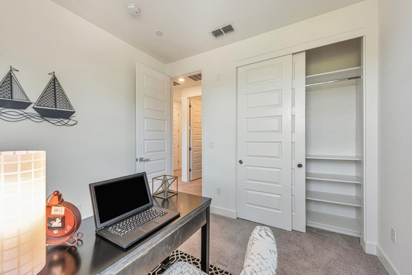 96 Zenith Common Fremont, CA 94539 - Photo 24 of 53 a room with furniture and a window