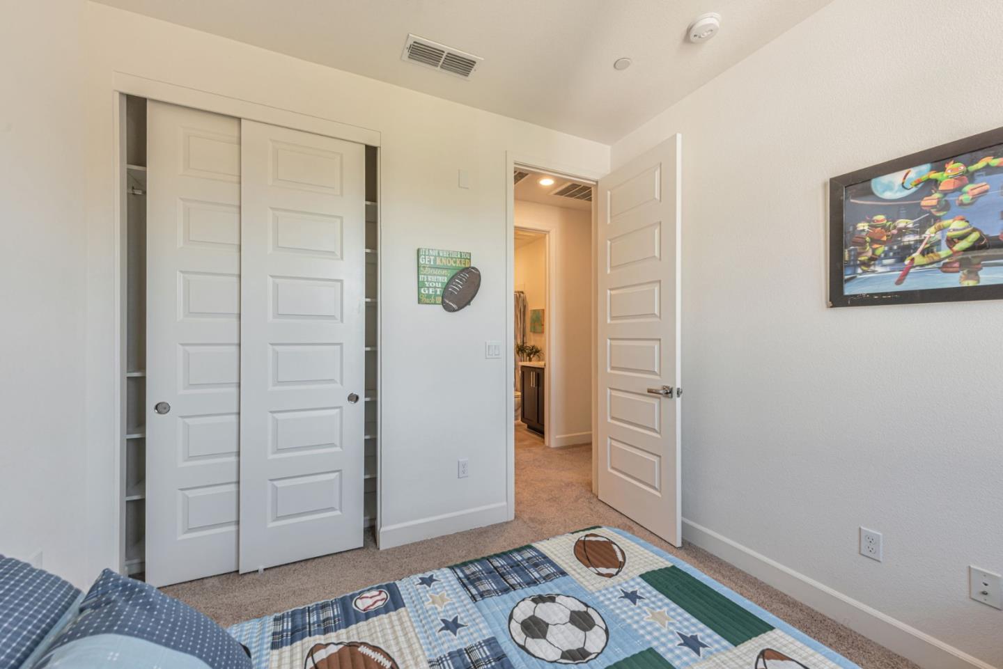 96 Zenith Common Fremont, CA 94539 - Photo 26 of 53 a view of livingroom with closet and wooden floor