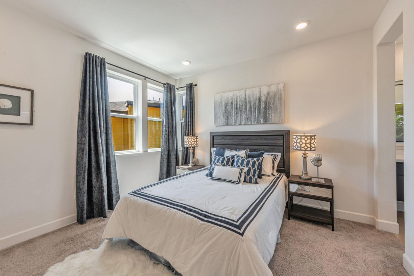 96 Zenith Common Fremont, CA 94539 - Photo 29 of 53 a bedroom with a bed and a window