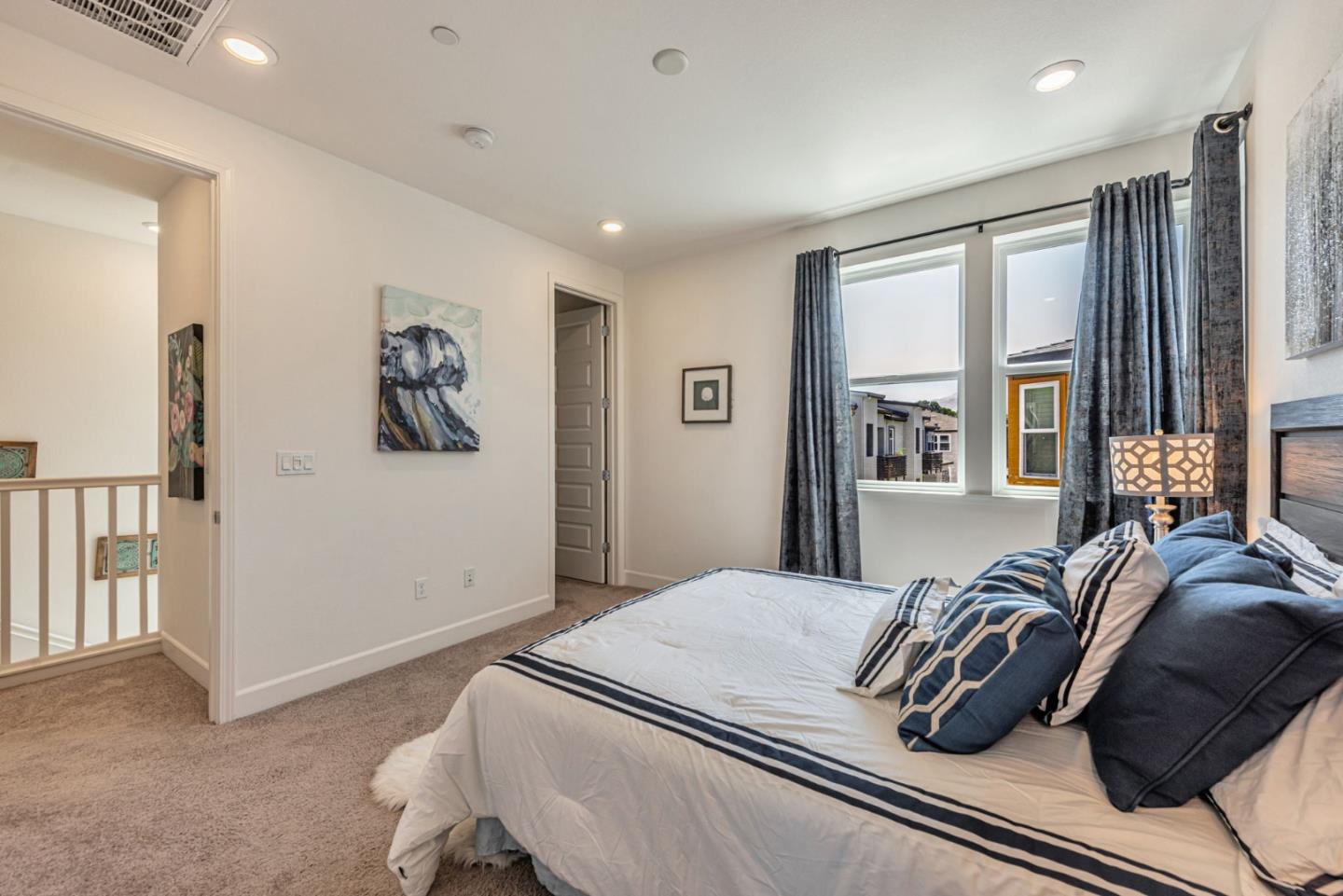 96 Zenith Common Fremont, CA 94539 - Photo 30 of 53 a bedroom with a bed and a window