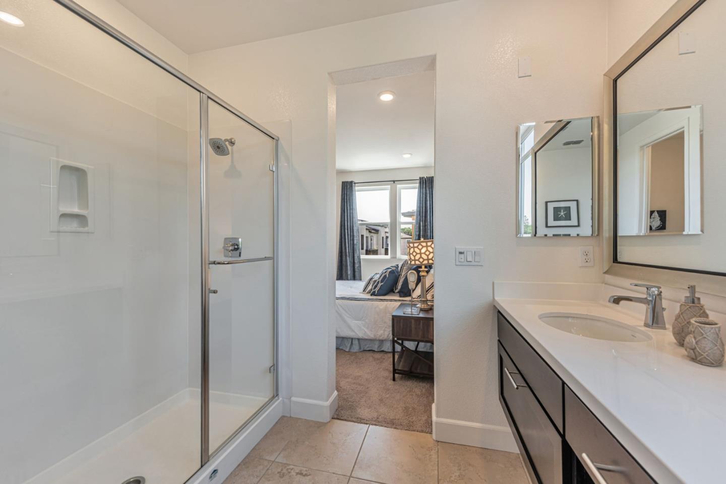 96 Zenith Common Fremont, CA 94539 - Photo 34 of 53 a bathroom with a sink a toilet and shower