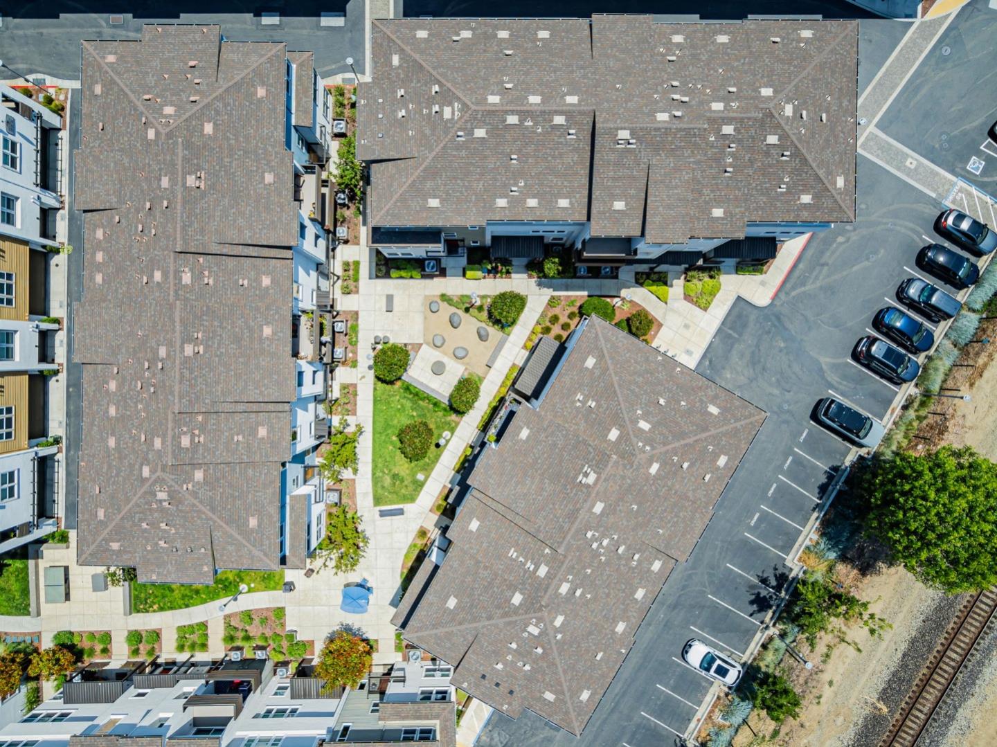 96 Zenith Common Fremont, CA 94539 - Photo 53 of 53 an aerial view of residential houses with yard