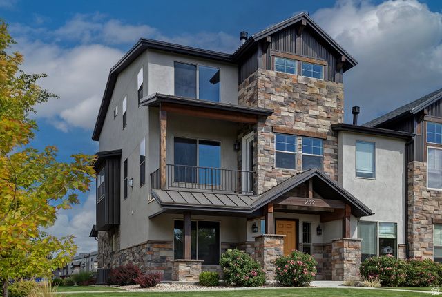 252 East Sandy Sage Way Sandy, UT 84070 - Photo 1 of 36 Stucco exterior with stone accents and dark trim