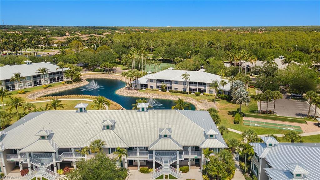 7940 Mahogany Run Lane, Unit 625 Naples, FL 34113 - Photo 18 of 30 an aerial view of a house with a swimming pool yard and outdoor seating